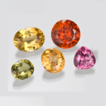 Multi-color garnet gemstones natural stones in red, green, and orange for healing, energy, and jewelry | Gemstonescraft.