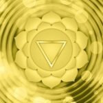 Solar Plexus Chakra Manipura glowing with golden energy, symbolizing confidence, willpower, and personal strength.
